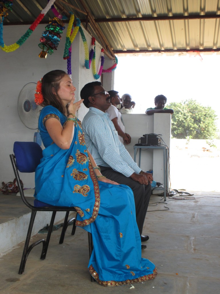Researcher and S.H.E.L.T.E.R. co-founder Hanna Blaney teaches deep breathing and meditation to widows at the first self-help group meeting  (with Paul Raja Rao, Director of B.I.R.D.S., translating)